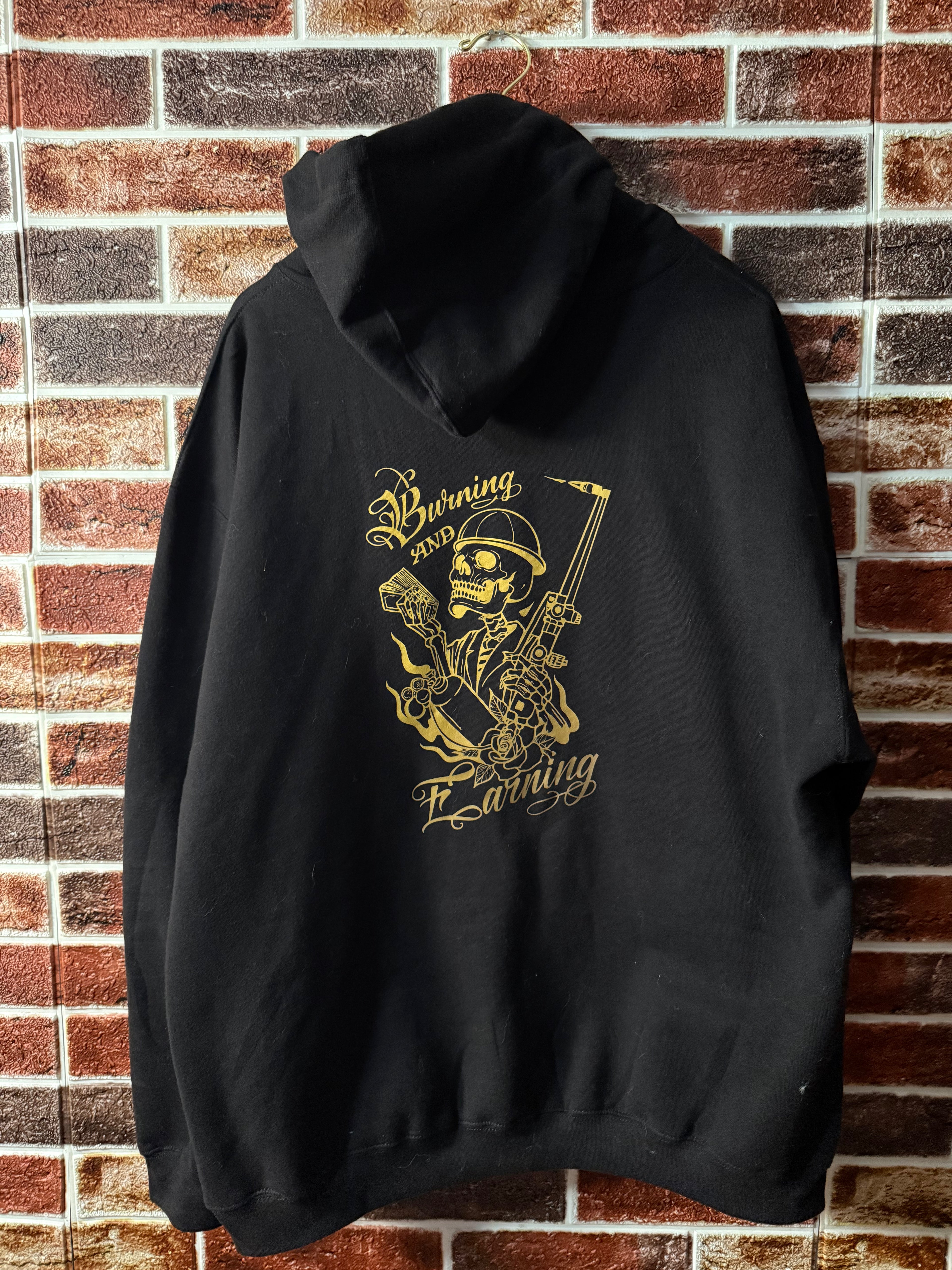 Burning and earning hoodie
